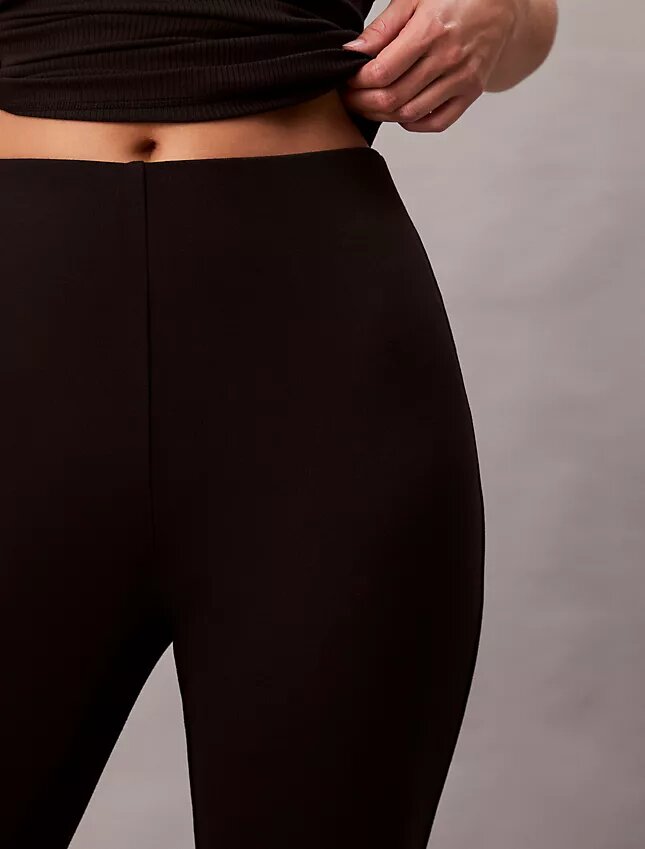 Pantaloni slim svasati in ponte Pantaloni slim svasati in ponte