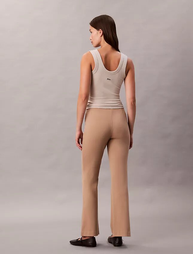 Pantaloni slim svasati in ponte Pantaloni slim svasati in ponte