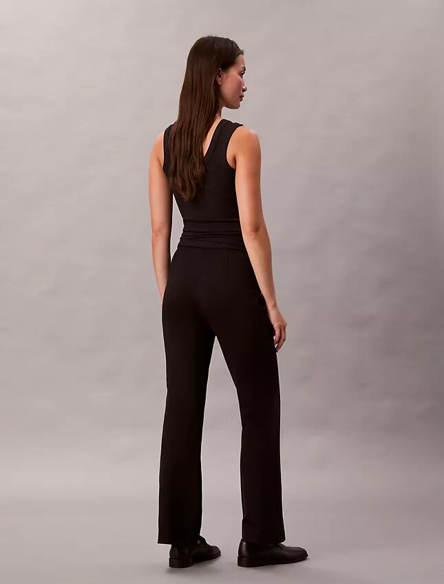Pantaloni slim svasati in ponte Pantaloni slim svasati in ponte