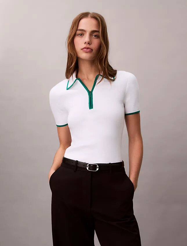 Polo classica con zip a un quarto Polo classica con zip a un quarto