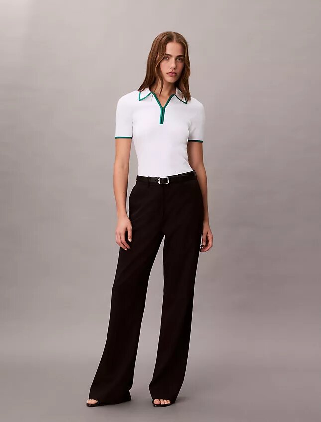 Polo classica con zip a un quarto Polo classica con zip a un quarto