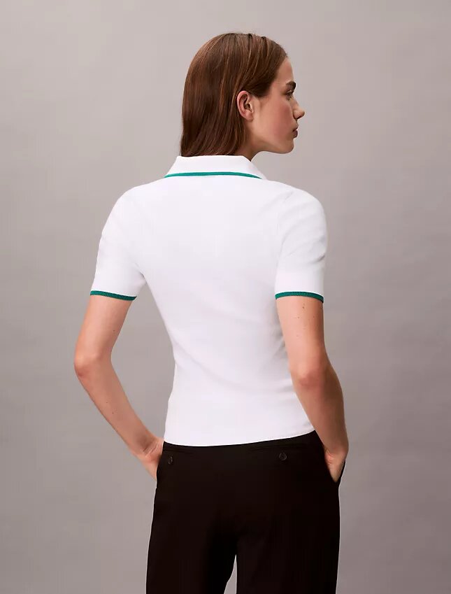 Polo classica con zip a un quarto Polo classica con zip a un quarto