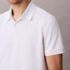 Polo con colletto a blocchi di colore in piqué
