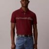 Polo con zip a un quarto e bordino a contrasto Polo con zip a un quarto e bordino a contrasto