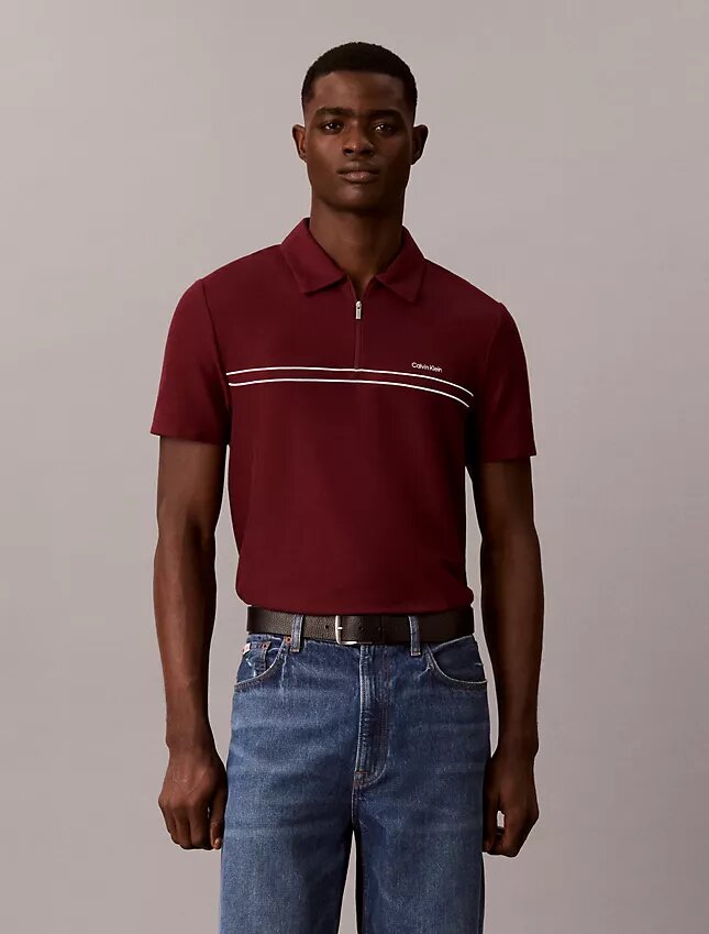 Polo con zip a un quarto e bordino a contrasto Polo con zip a un quarto e bordino a contrasto