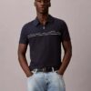 Polo con zip a un quarto e bordino a contrasto Polo con zip a un quarto e bordino a contrasto
