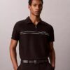 Polo con zip a un quarto e bordino a contrasto Polo con zip a un quarto e bordino a contrasto