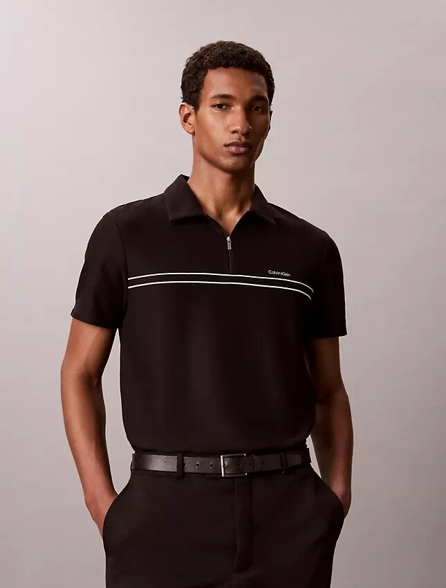 Polo con zip a un quarto e bordino a contrasto Polo con zip a un quarto e bordino a contrasto
