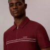 Polo con zip a un quarto e bordino a contrasto Polo con zip a un quarto e bordino a contrasto
