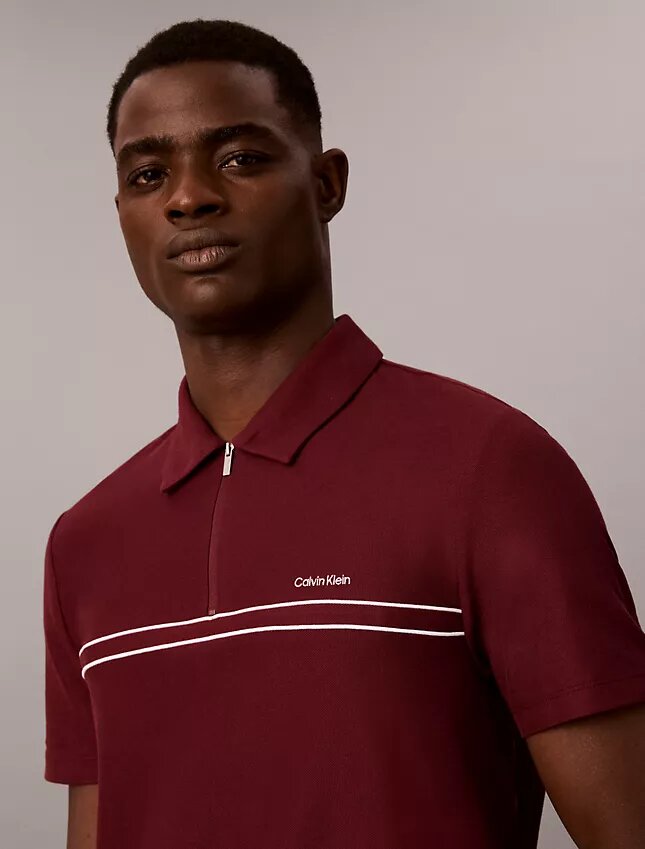 Polo con zip a un quarto e bordino a contrasto Polo con zip a un quarto e bordino a contrasto