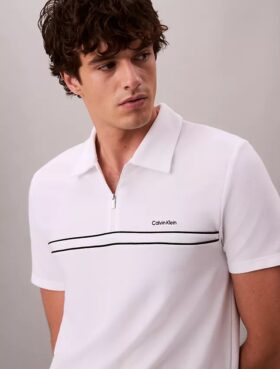 Polo con zip a un quarto e bordino a contrasto