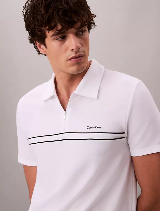 Polo con zip a un quarto e bordino a contrasto Polo con zip a un quarto e bordino a contrasto