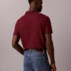 Polo con zip a un quarto e bordino a contrasto Polo con zip a un quarto e bordino a contrasto