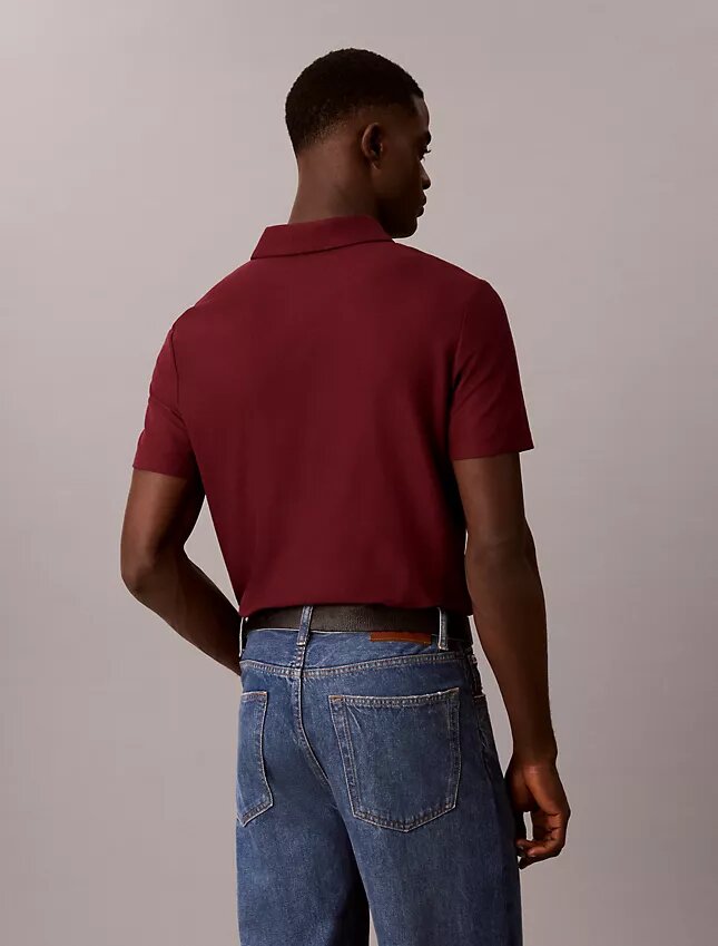 Polo con zip a un quarto e bordino a contrasto Polo con zip a un quarto e bordino a contrasto