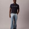 Polo con zip a un quarto e bordino a contrasto Polo con zip a un quarto e bordino a contrasto