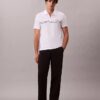 Polo con zip a un quarto e bordino a contrasto Polo con zip a un quarto e bordino a contrasto