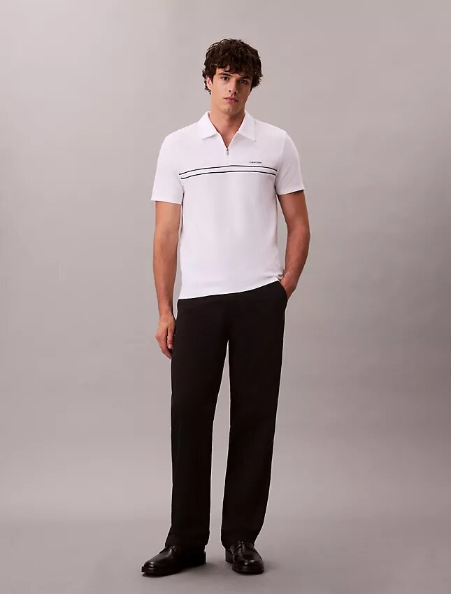 Polo con zip a un quarto e bordino a contrasto Polo con zip a un quarto e bordino a contrasto
