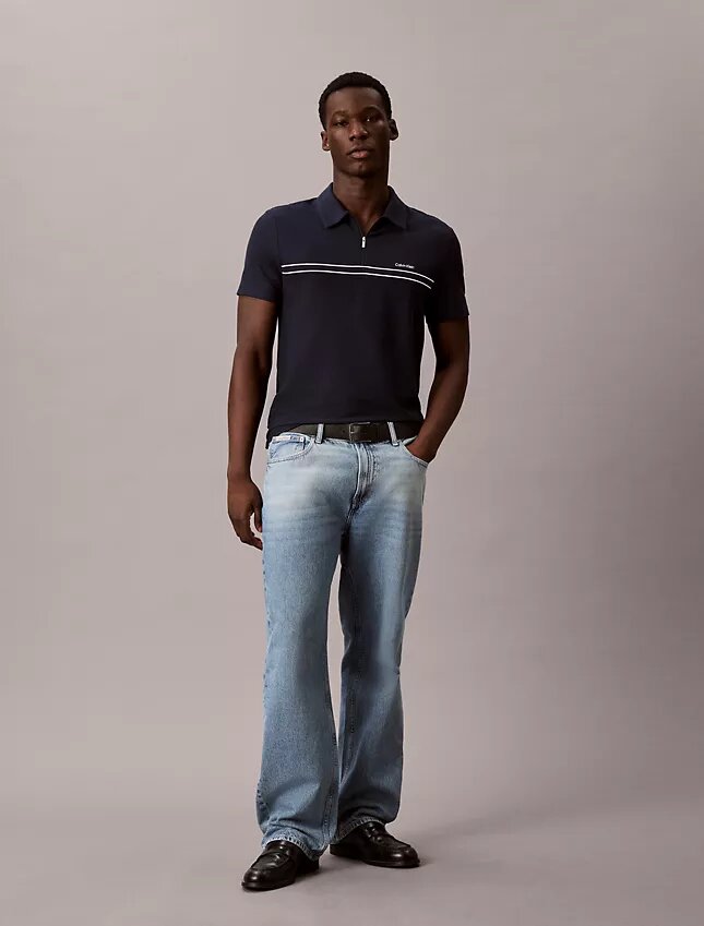 Polo con zip a un quarto e bordino a contrasto Polo con zip a un quarto e bordino a contrasto