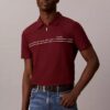 Polo con zip a un quarto e bordino a contrasto Polo con zip a un quarto e bordino a contrasto