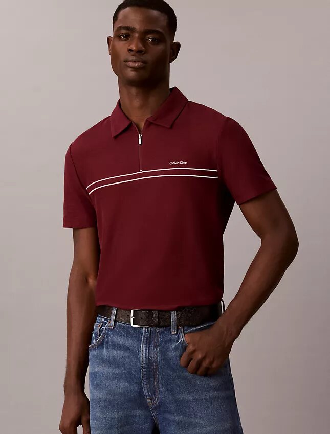 Polo con zip a un quarto e bordino a contrasto Polo con zip a un quarto e bordino a contrasto