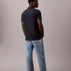 Polo con zip a un quarto e bordino a contrasto Polo con zip a un quarto e bordino a contrasto