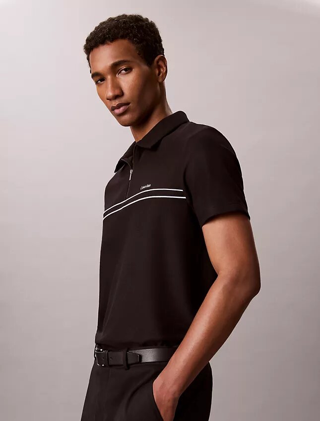 Polo con zip a un quarto e bordino a contrasto Polo con zip a un quarto e bordino a contrasto