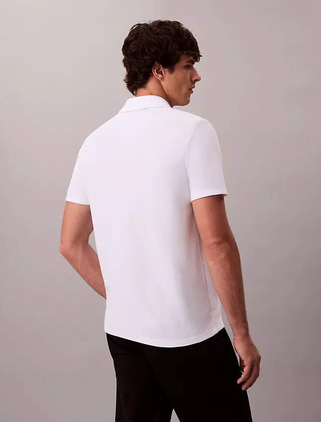 Polo con zip a un quarto e bordino a contrasto Polo con zip a un quarto e bordino a contrasto