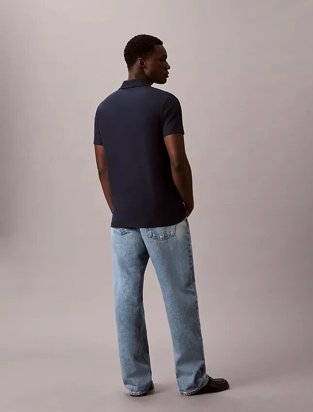 Polo con zip a un quarto e bordino a contrasto Polo con zip a un quarto e bordino a contrasto