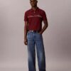 Polo con zip a un quarto e bordino a contrasto Polo con zip a un quarto e bordino a contrasto