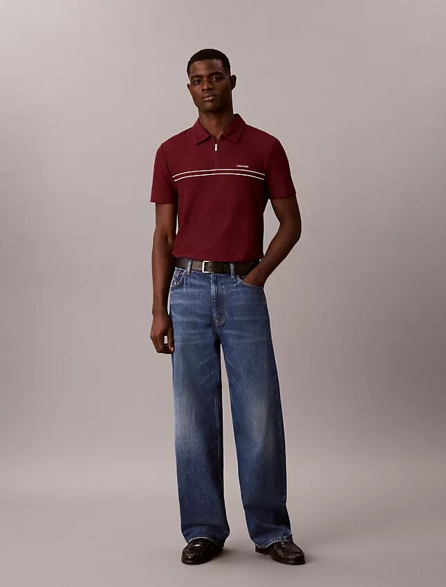 Polo con zip a un quarto e bordino a contrasto Polo con zip a un quarto e bordino a contrasto