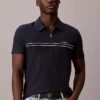 Polo con zip a un quarto e bordino a contrasto Polo con zip a un quarto e bordino a contrasto