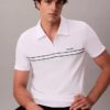 Polo con zip a un quarto e bordino a contrasto Polo con zip a un quarto e bordino a contrasto