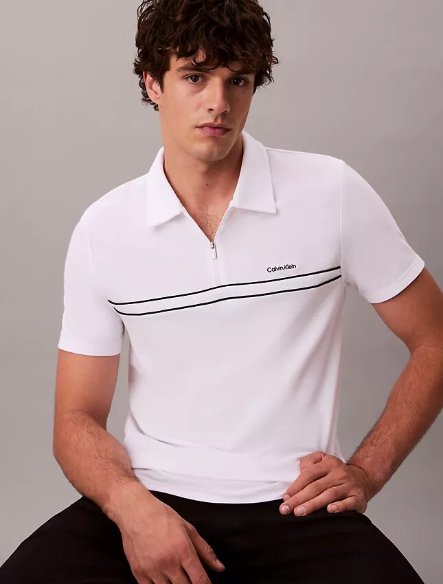 Polo con zip a un quarto e bordino a contrasto Polo con zip a un quarto e bordino a contrasto