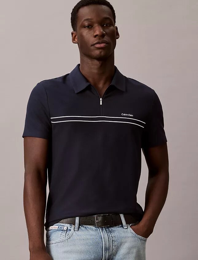 Polo con zip a un quarto e bordino a contrasto Polo con zip a un quarto e bordino a contrasto