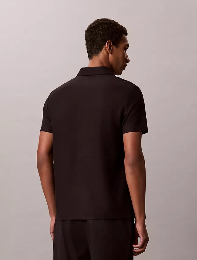 Polo con zip a un quarto e bordino a contrasto Polo con zip a un quarto e bordino a contrasto