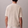Polo in morbido cotone a trama waffle Polo in morbido cotone a trama waffle