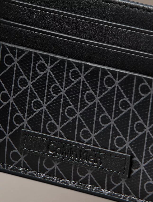 Portacarte con logo ripetuto su tutta la superficie Portacarte con logo ripetuto su tutta la superficie