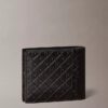 Portafoglio a doppia piega con monogramma goffrato su tutta la superficie e portamonete Portafoglio a doppia piega con monogramma goffrato su tutta la superficie e portamonete