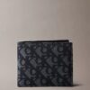 Portafoglio a doppia piega con monogramma su tutta la superficie Portafoglio a doppia piega con monogramma su tutta la superficie