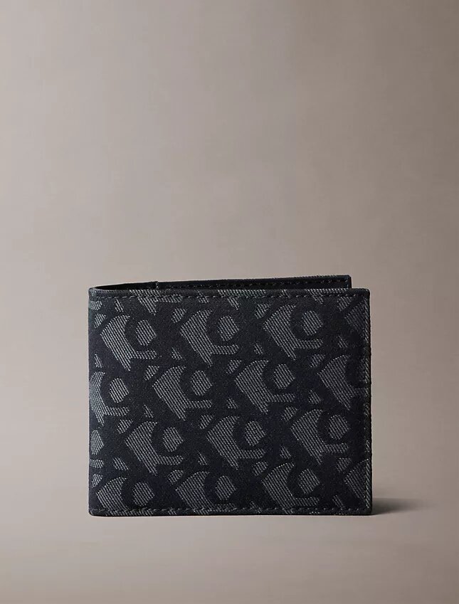 Portafoglio a doppia piega con monogramma su tutta la superficie Portafoglio a doppia piega con monogramma su tutta la superficie