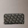 Portafoglio lungo con zip e Monogram su tutta la superficie