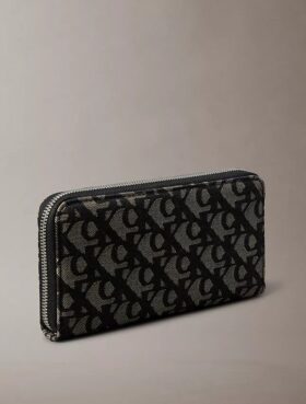 Portafoglio lungo con zip e Monogram su tutta la superficie