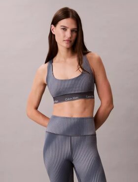 Reggiseno sportivo a dorso a vogatore con stampa sportiva moderna, per attività a medio impatto