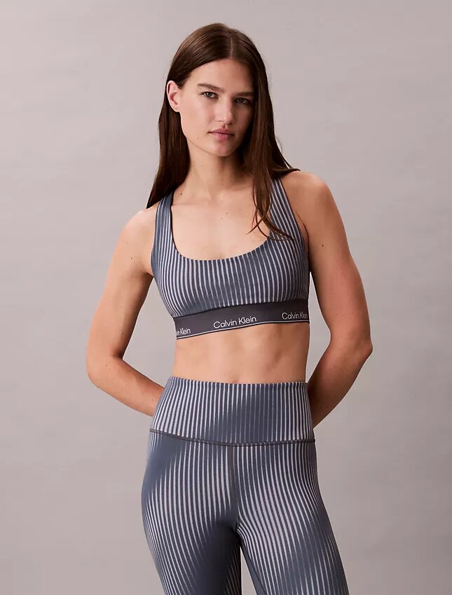Reggiseno sportivo a dorso a vogatore con stampa sportiva moderna, per attività a medio impatto Reggiseno sportivo a dorso a vogatore con stampa sportiva moderna, per attività a medio impatto