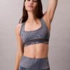 Reggiseno sportivo a dorso a vogatore con stampa sportiva moderna, per attività a medio impatto Reggiseno sportivo a dorso a vogatore con stampa sportiva moderna, per attività a medio impatto