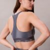 Reggiseno sportivo a dorso a vogatore con stampa sportiva moderna, per attività a medio impatto Reggiseno sportivo a dorso a vogatore con stampa sportiva moderna, per attività a medio impatto