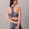 Reggiseno sportivo a dorso a vogatore con stampa sportiva moderna, per attività a medio impatto Reggiseno sportivo a dorso a vogatore con stampa sportiva moderna, per attività a medio impatto