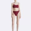 Slip bikini a vita alta in tinta