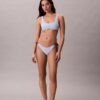 Slip bikini con monogramma grafico e lacci laterali