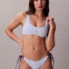 Slip bikini con monogramma grafico e lacci laterali
